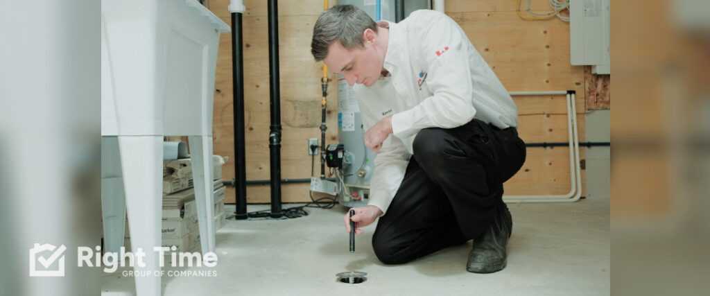 Technician inspecting a residential floor drain in Peel Region.